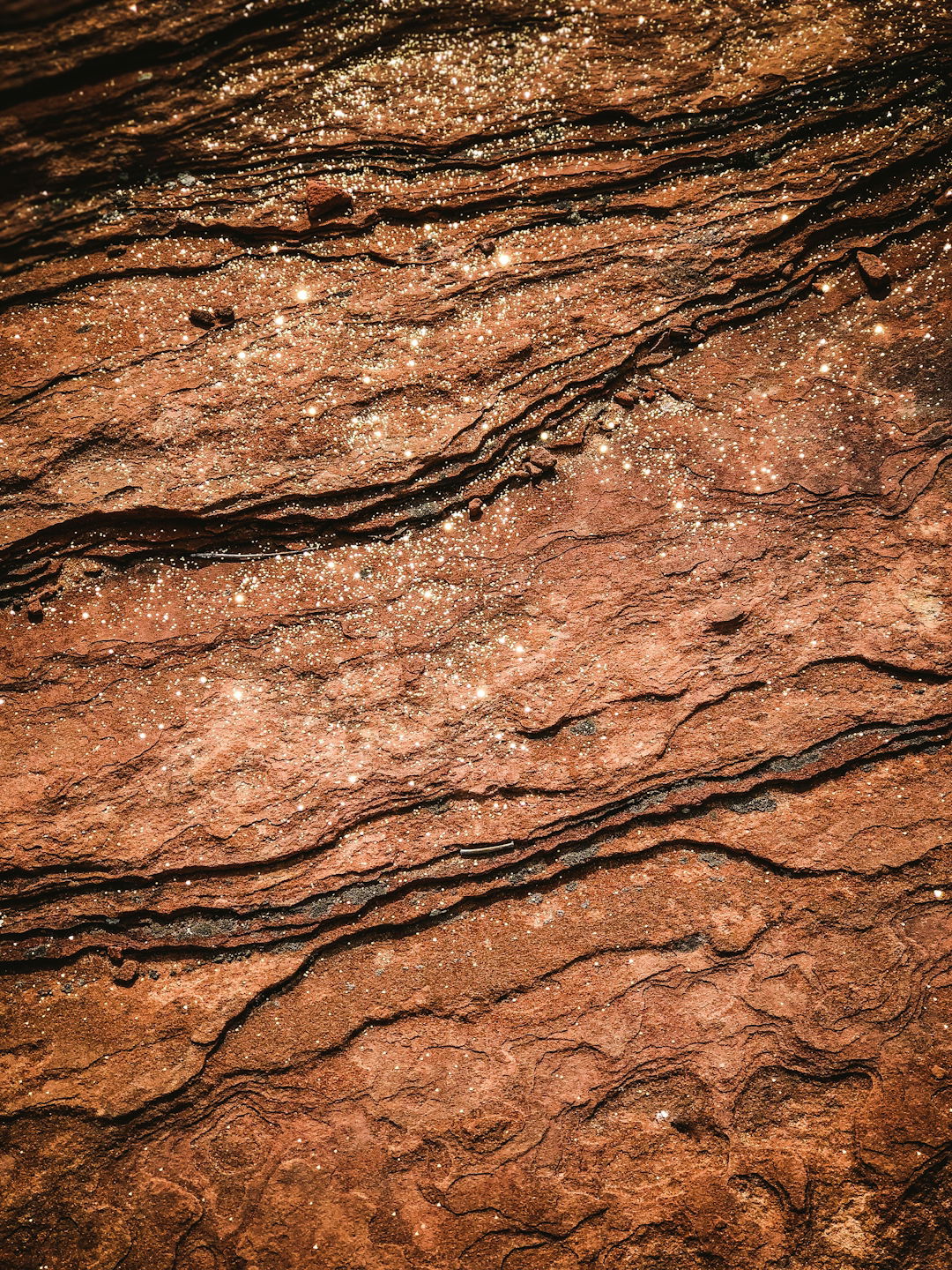 a-close-up-of-a-rock-surface-with-water.jpg a close up of a rock surface with water